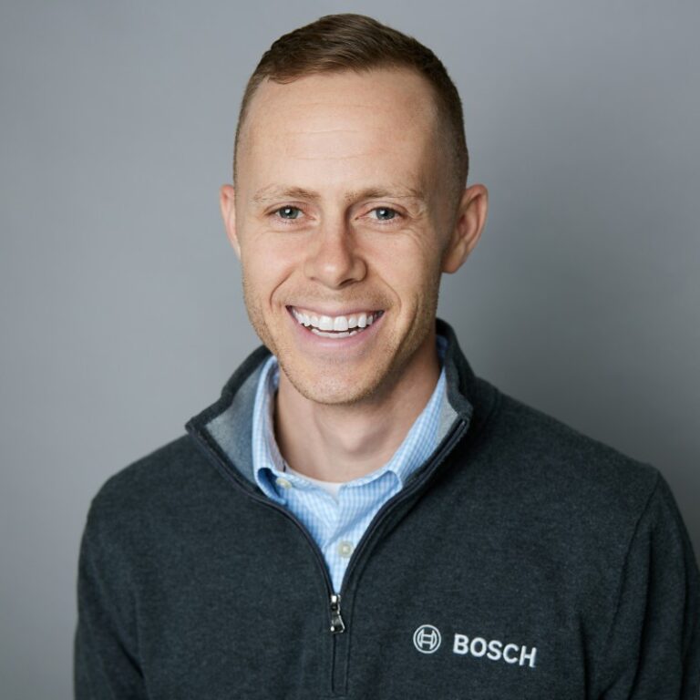 Guy Wearing Bosch Shirt Smiling